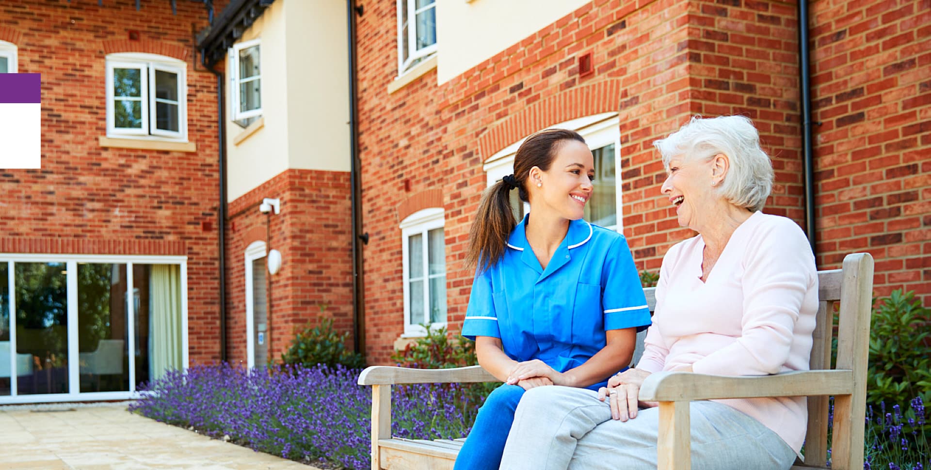 Home care aide assisting a patient with daily activities